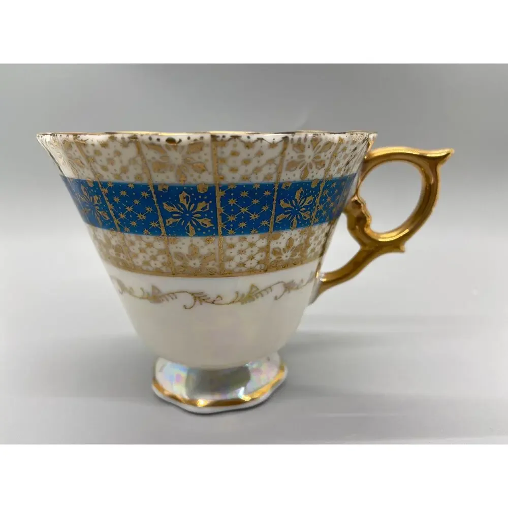 Vintage Porcelain Lusterware Tea Cup with Blue and Gold Toned Floral Design